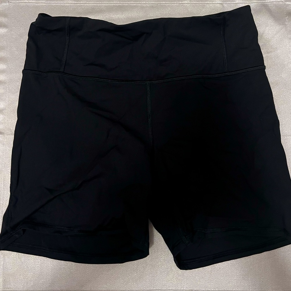 Black short Athleta biker shorts.